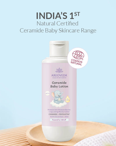 AreoVeda Ceramide Baby Lotion bottle on a light blue background with certification logo.