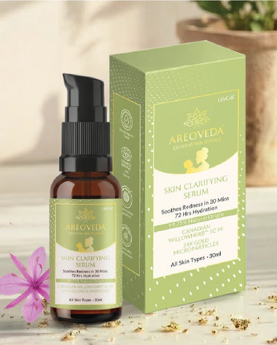 Areoveda skin clarifying serum bottle and packaging on a neutral background