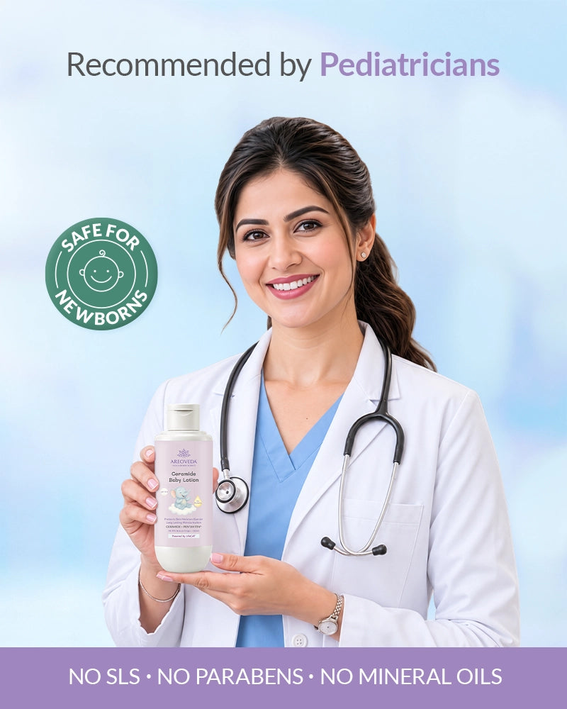 Female pediatrician in a white coat holding AreoVeda Ceramide Baby Lotion bottle.