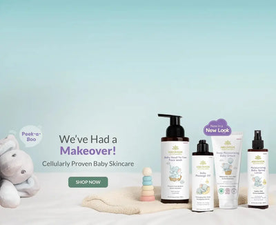 Baby skincare products with a teddy bear and toys on a light blue background